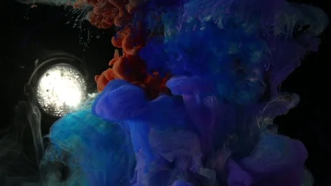 Illuminated Colored Ink Sinking Background (2/3) Stock Footage 77777014