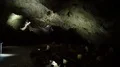 Illuminated dark cave passage inside mountain 4k or 4k+ Resolution