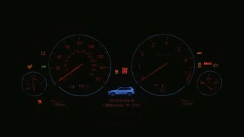 Illuminated dashboard speedometer close up 2017 BMW X5 xDrive40e iPerformance Stock Footage 159925567