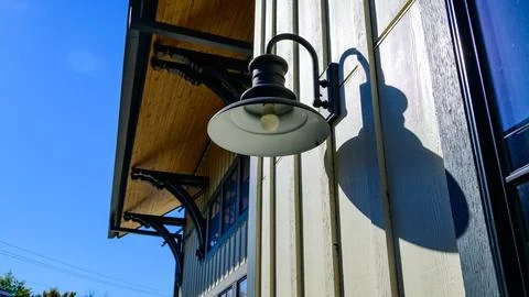 Illuminated decorative lighting elements on the exterior faade of the Red F.. Fotos de archivo