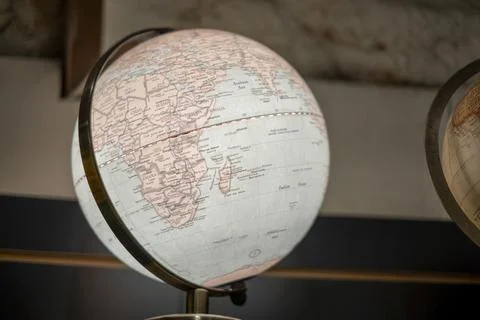Illuminated Desk Globe With Glowing Map Detail Stock Photos