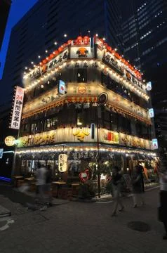 Illuminated dining complex with many restaurants captured in Hibiya in Chiyod Stock Photos