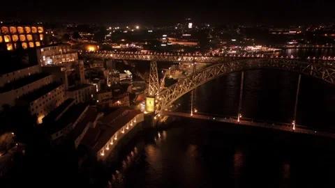 Illuminated Dom Luis I Bridge Arch Over Douro at Night Stock Footage 344798877