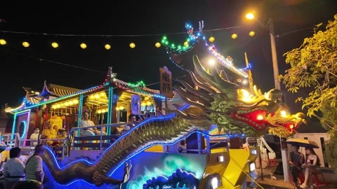 Illuminated Dragon Float at Nine Emperor God Festival Procession Stock Footage 347892340