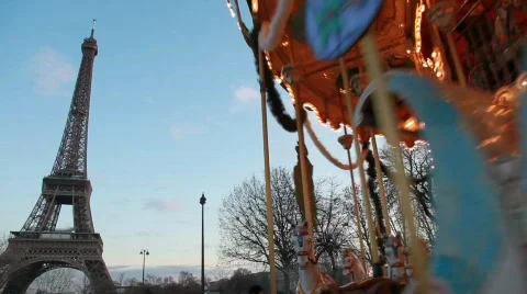 Illuminated Eiffel Tower and carousel in evening paris, Paris, France. Stock Footage 878206