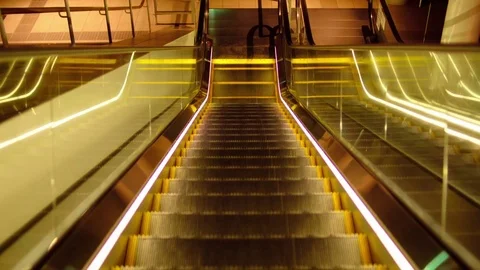 Illuminated escalator on the move Video stock 75820140