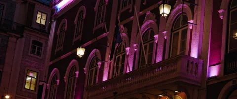Illuminated facades of old medieval architecture buildings at night during Ch Stock Footage 141365034