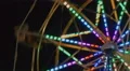 Illuminated Ferris Wheel Spinning 4k or 4k+ Resolution