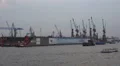 Illuminated ferry boats and docks in Hamburg harbour HD Footage