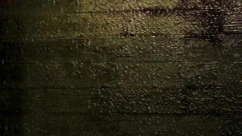 Illuminated fountain wall with flowing water texture design Thailand. Stock Footage 341245853