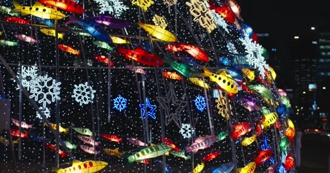 Illuminated geodesic dome with fish lanterns and snowflake patterns at Seoul Stock Footage 327322998