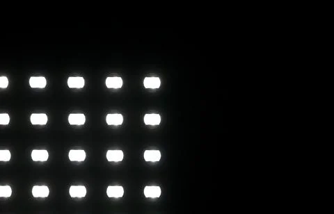 Illuminated Grid Pattern on Dark Background Stock Photos