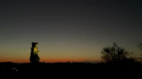 Illuminated GWK Statue at Twilight Sunset Horizon in Bali Stock Footage 337354736