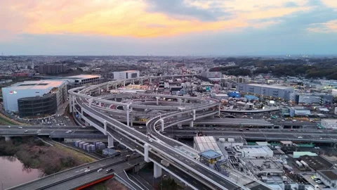 Illuminated Highway Junction | Magic Hour - 4K Aerial Video Stock Footage 333195298