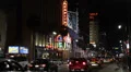 Illuminated Hollywood Boulevard Car Traffic Rush Hour Evening Night El Capitan HD Footage