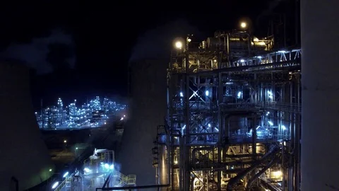 Illuminated installations at night in the factory, close, aerial view Stock Footage 86867437