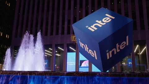 Illuminated Intel Cube Beside Fountain at Night Stock Footage 342409955