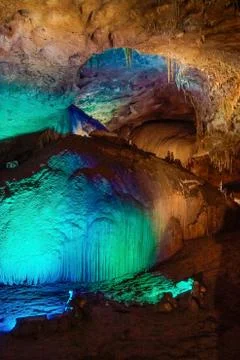 Illuminated interior of Prometheus Cave Stock Photos