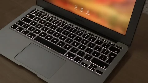Illuminated Laptop Computer Keyboard with key led lights turning on and off Stock Footage 242024646