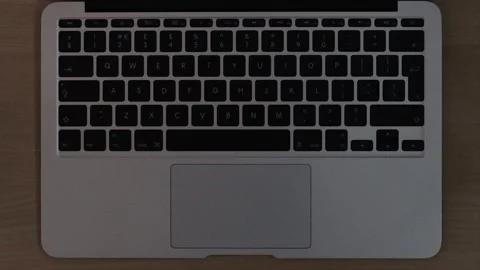Illuminated Laptop Computer Keyboard with key led lights turning on and off Stock Footage 242024923