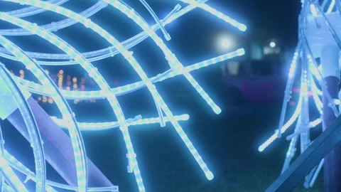 Illuminated LED light decorations arranged in artistic design, glowing brightly Stock Footage 295064268