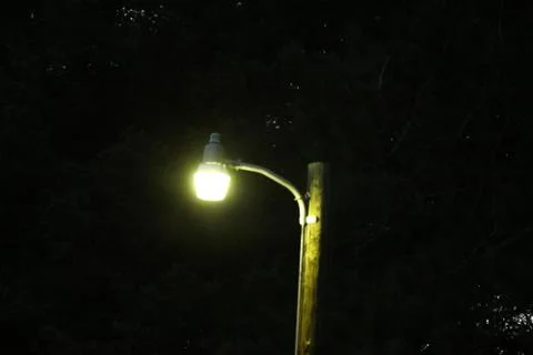 Illuminated Light Post at Night Stock Photos