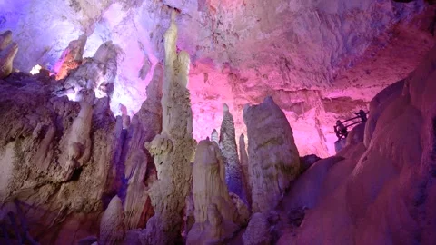 Illuminated Limestone Cave with Stalactites and Stalagmites Video stock 342230842