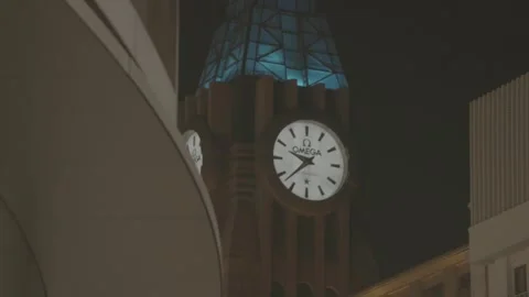 Illuminated Luxury Clock Tower Above Wangfujing at Night Stock Footage 340480744