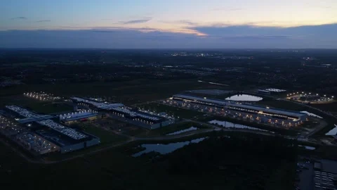 Illuminated Meta server farm at dusk, vibrant tech landscape. Stock Footage 318620398