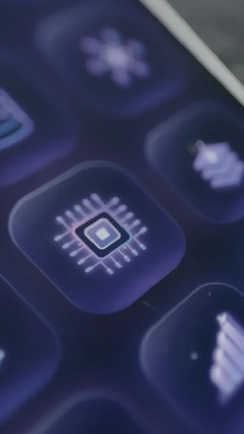 Illuminated microprocessor icon sits on a modern purple smartphone interface Видео 342488397