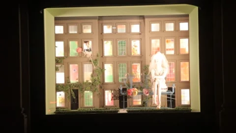 Illuminated Miniature Building Window Display at Night Vidéo 341019306