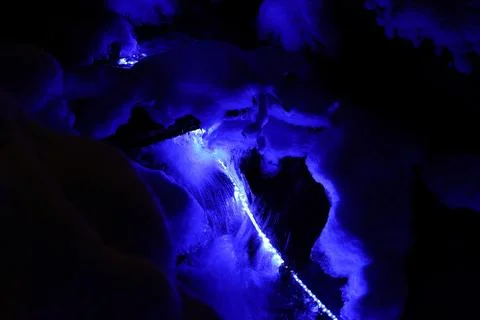 Illuminated mountain stream Stock Photos