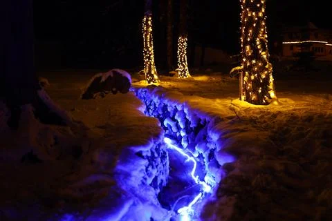 Illuminated mountain stream Stock Photos