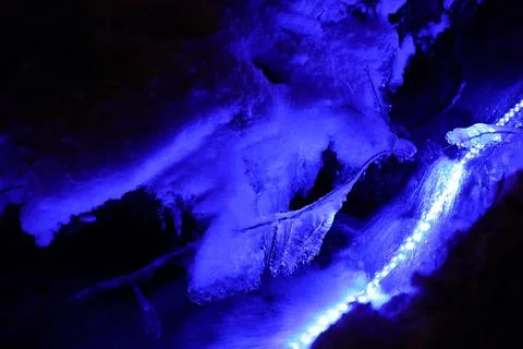 Illuminated mountain stream Stock Photos