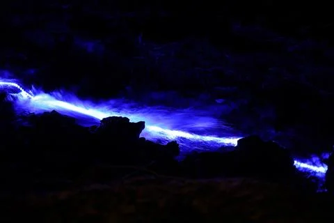 Illuminated mountain stream Stock Photos