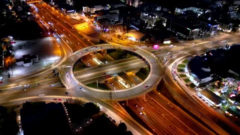 A illuminated multilevel highway junction interchange Video stock 264157219