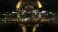 Illuminated Night Aerial View Iconic Eiffel Tower Paris Cityscape Reflection HD Footage