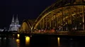 Illuminated Night Cologne Cathedral Skyline Cityscape Rush Hour Trains Passing HD Footage
