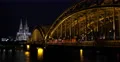 Illuminated Night Cologne Cathedral Skyline Cityscape Rush Hour Trains Passing 4k or 4k+ Resolution