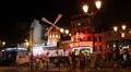 Illuminated Night Moulin Rouge Cabaret Show Paris Car Traffic People Passing HD Footage