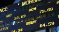 Illuminated Night Stock Market Shares Ticker NYC New York City Broker Profit HD Footage