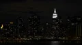 Illuminated NYC by night, Empire State Building New York City Skyline East River HD Footage