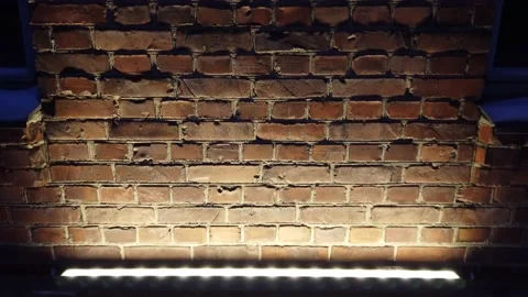 Illuminated old brick wall at night Stock Footage 149169683