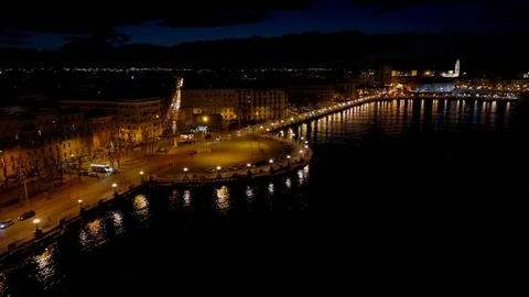 Illuminated panoramic tower 'lights up' the Bari skyline Stock Footage 124215400
