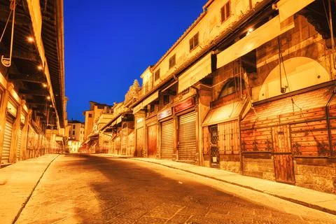 Illuminated Ponte Vecchio Bridge with Reflection in Arno River at Dusk, Flore Stock Photos