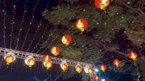 Illuminated Red Lanterns and String Lights for Chinese New Year in Singapore Stock Footage 328564735