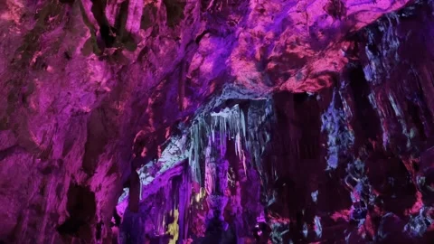 Illuminated Rock Formations Inside St. Michael’s Cave in Gibraltar Stock-Footage 319794332