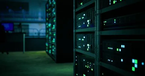 Illuminated server racks in a dark data center during late night hours Stock Illustration