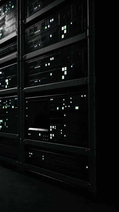 Illuminated server racks glow in the dim light of the tech environment Stock Footage 334206387