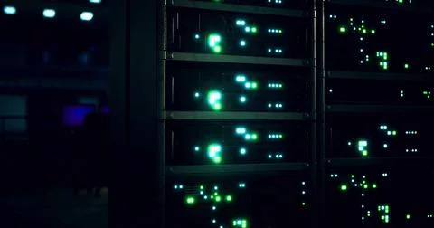 Illuminated server racks in a modern data center at night Stock Illustration